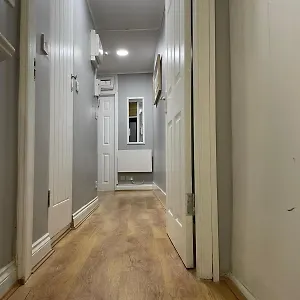 E1 -flats