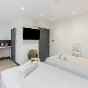 Urban Simplicity Twin Bed With Kitchenette Apartment
