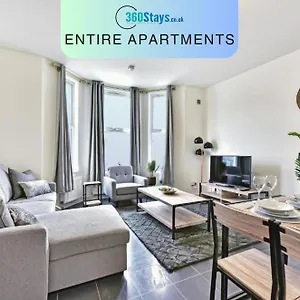 West Serviced Apartments: 2-bed, 2-bath With Parking Near Station Apartment *